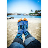 Blue Stripes with Orange Crew Socks on the Beach